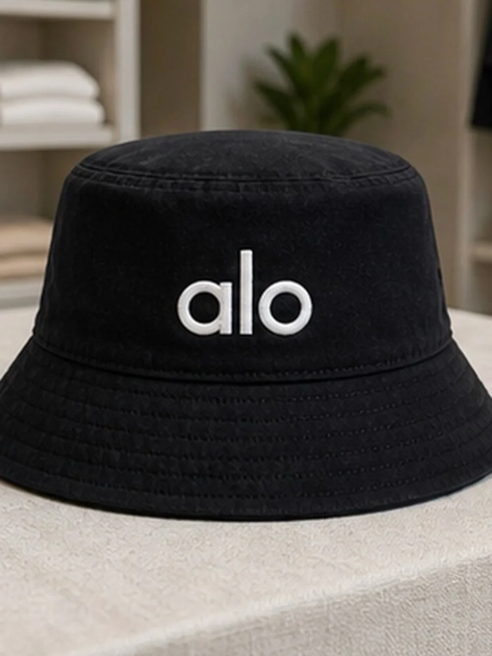 ALO Yoga Black Bucket Hat with White Logo